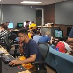 Gamers try out the college's e-gaming space in Whitney Hall during the Student Involvement Fair.